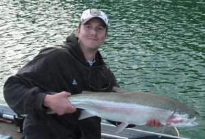 Derek with a monster of a rainbow caught from years before.  