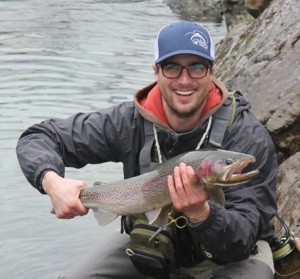 Pacific Angler customer, Brendan, with his first steelhead on the fly!