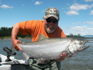 Mike Holland with a beautiful, fresh Kitimat River Chinook (King) Salmon.  Photo courtesy of Tracey Hittel of Kitimat Lodge 