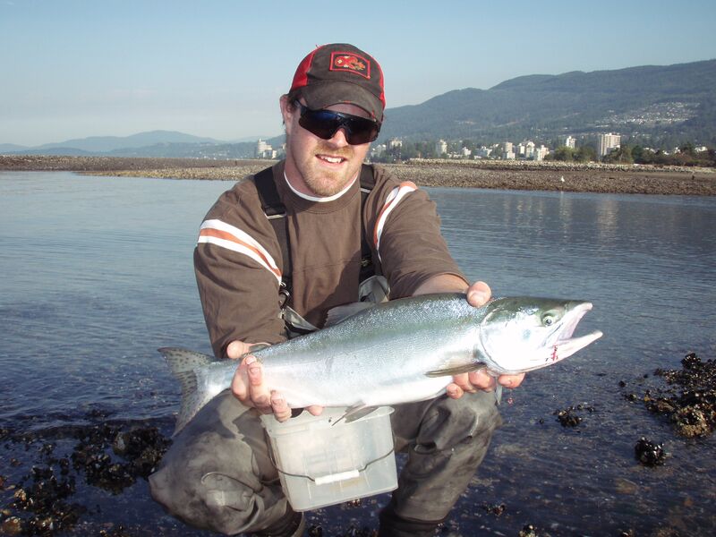 Student Byron with a pink salmon.