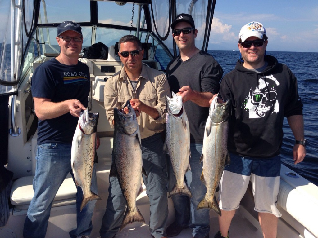 Jason's mastering local saltwater salmon student's with their catch!