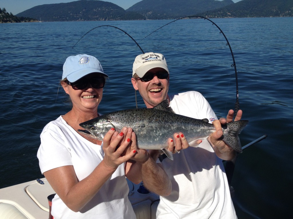 Guest Nadine with her first fish, which was quickly released!