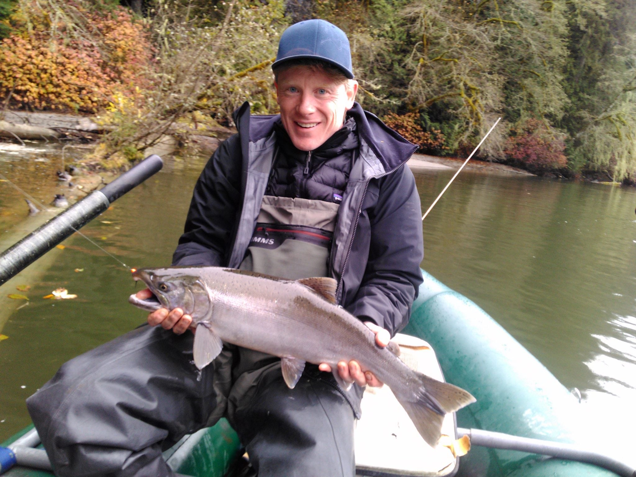 Guide Ryan with a nice coho.